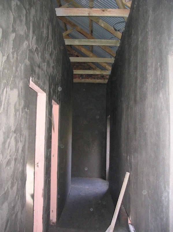 bedroom down passage with plaster.jpg